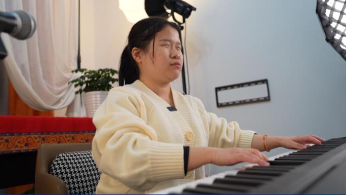 湖南“95后”全盲女孩用音乐做“眼”勇追梦